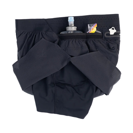 Raide Research Trail Tech Short men's shorts in Black turned up to show the inner liner and loaded pockets