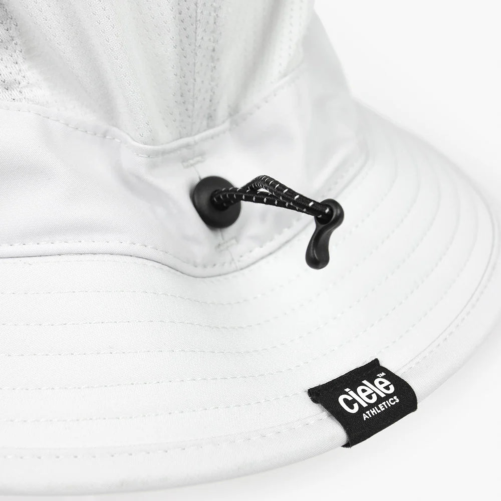 GOBucket-Comp-Athletics by Ciele in white with adjustable drawcord, lightweight breathable fabric, ideal for running and outdoor use in Canada