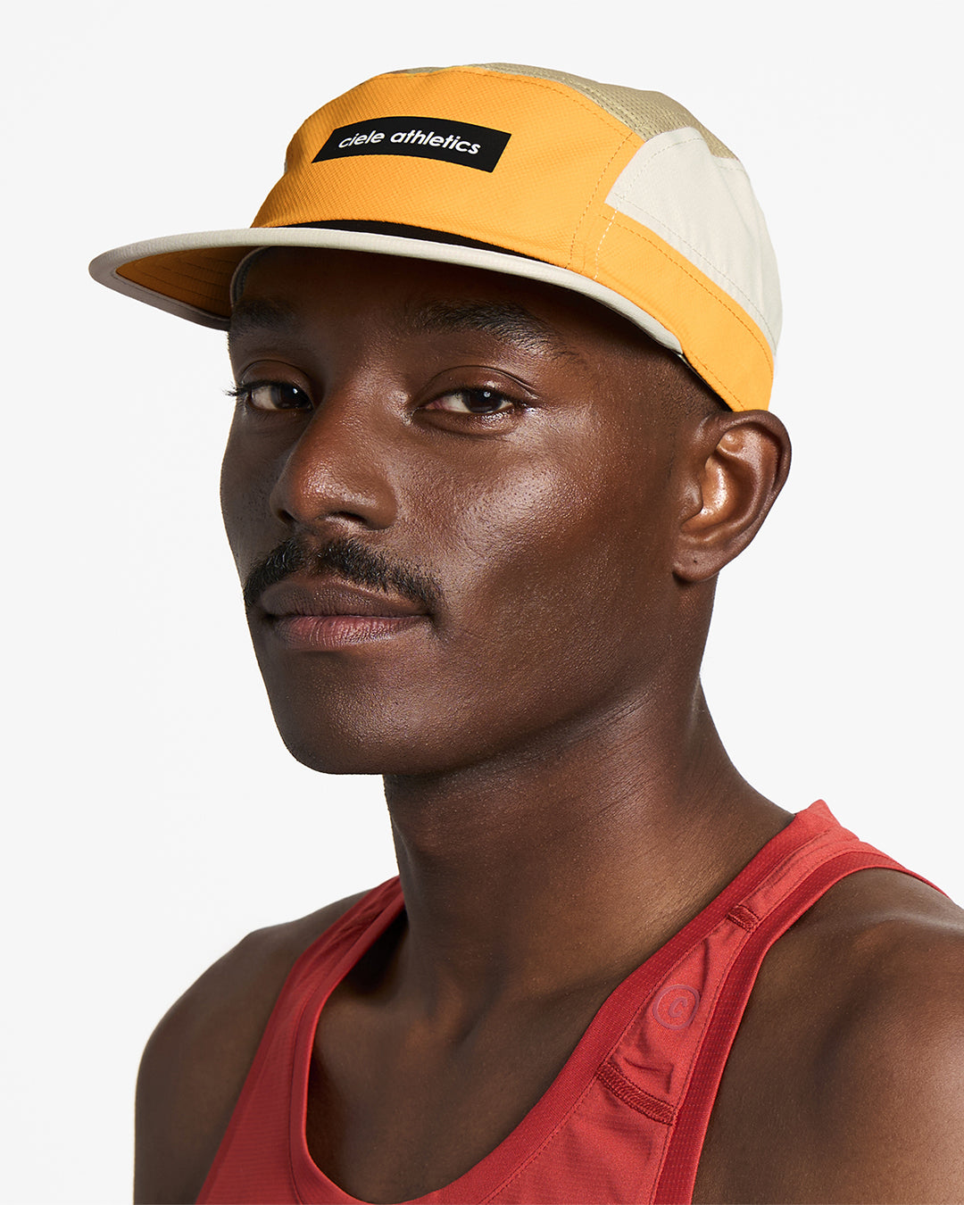 GOCap - Field - IconicBar by Ciele in yellow and beige with Coolmatic plus flowmesh panels for maximum ventilation, ideal for running and outdoor use