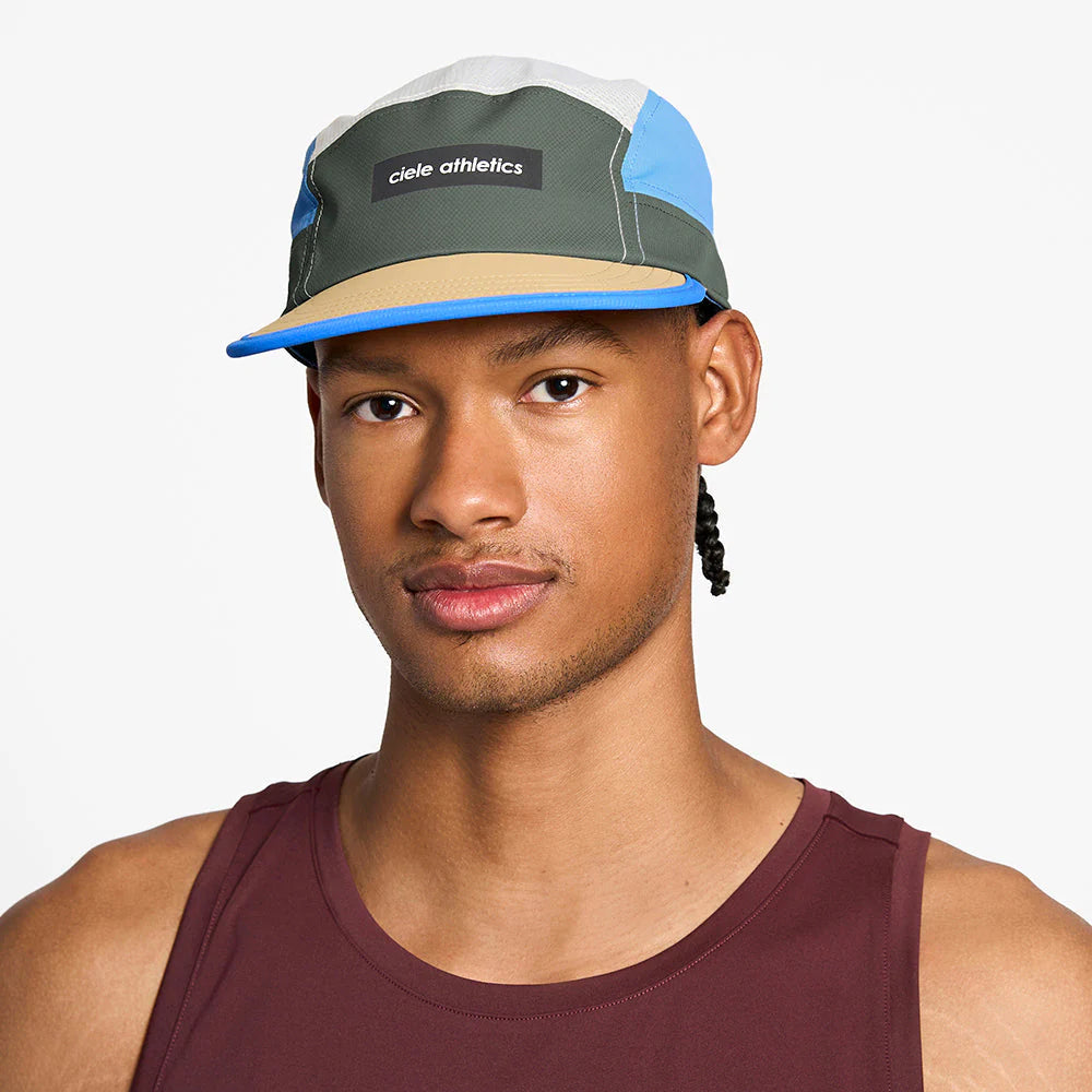 GOCap - Field - IconicBar by Ciele in green, blue, and beige with coolmatic plus flowmesh panels for ventilation, ideal for running and outdoor use
