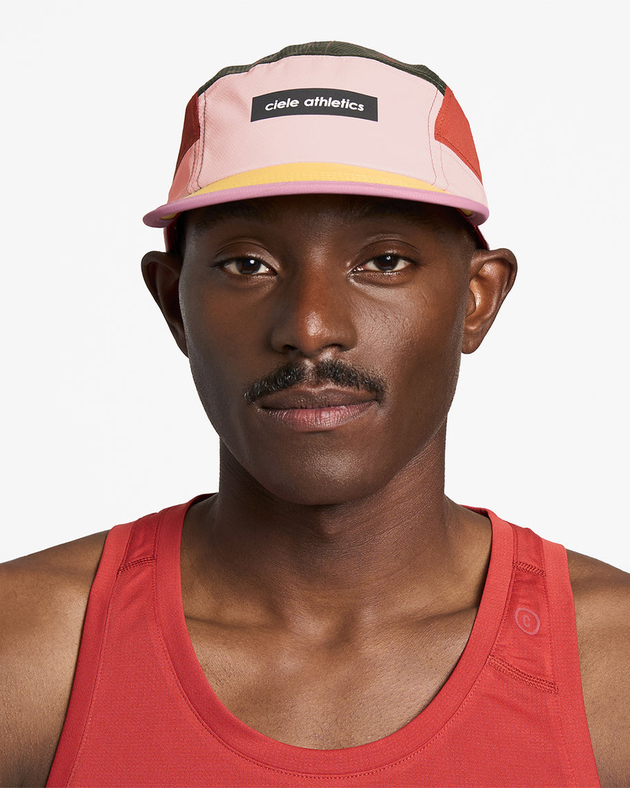 GOCap - Field - IconicBar by Ciele in pink, red, and yellow with coolmatic plus flowmesh for maximum ventilation, ideal for running and outdoor use