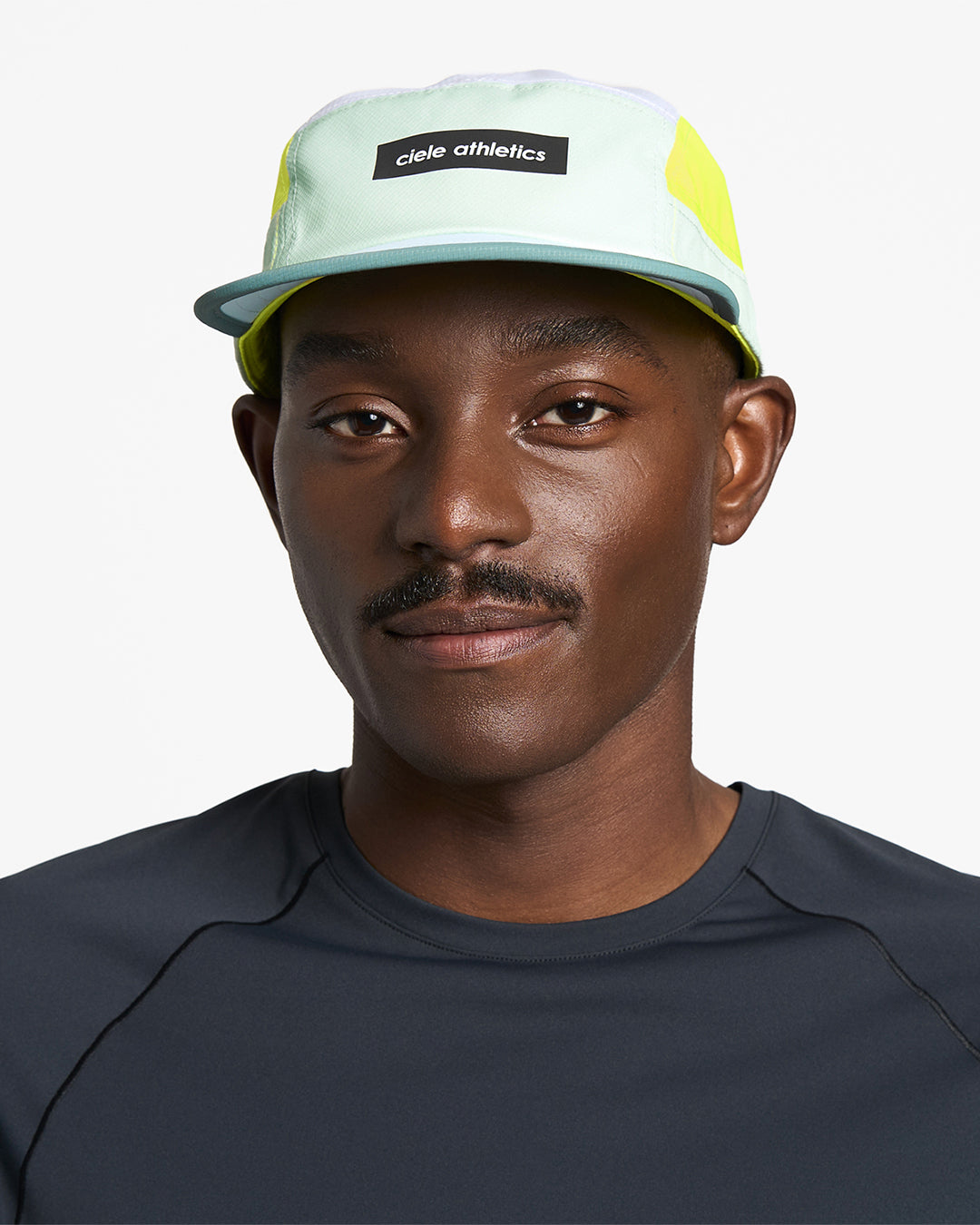 GOCap - Field - IconicBar by Ciele in light blue and neon yellow with coolmatic plus flowmesh ventilation, ideal for running and outdoor use