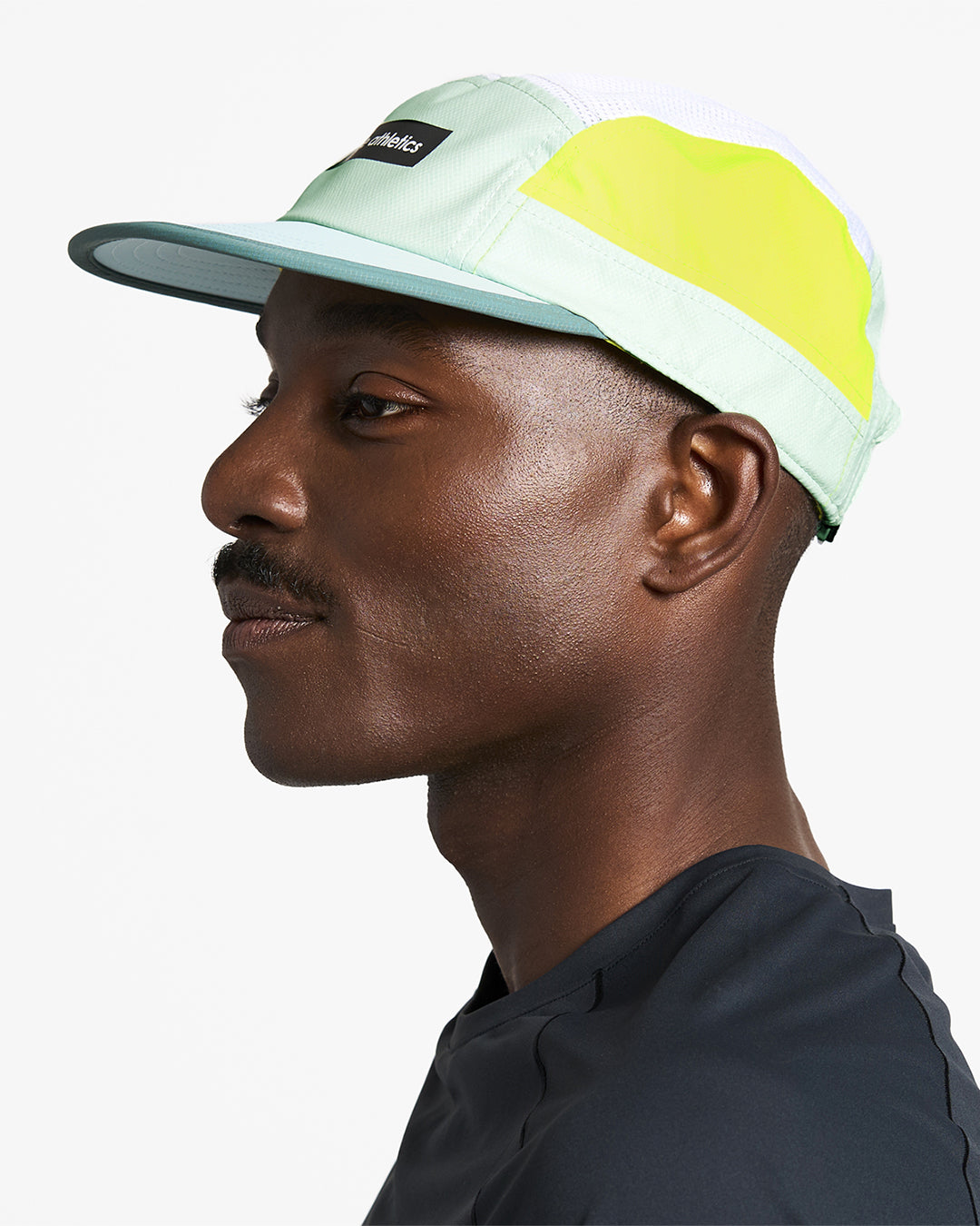 GOCap - Field - IconicBar by Ciele in mint green and neon yellow with coolmatic plus flowmesh ventilation, lightweight running cap for outdoor use