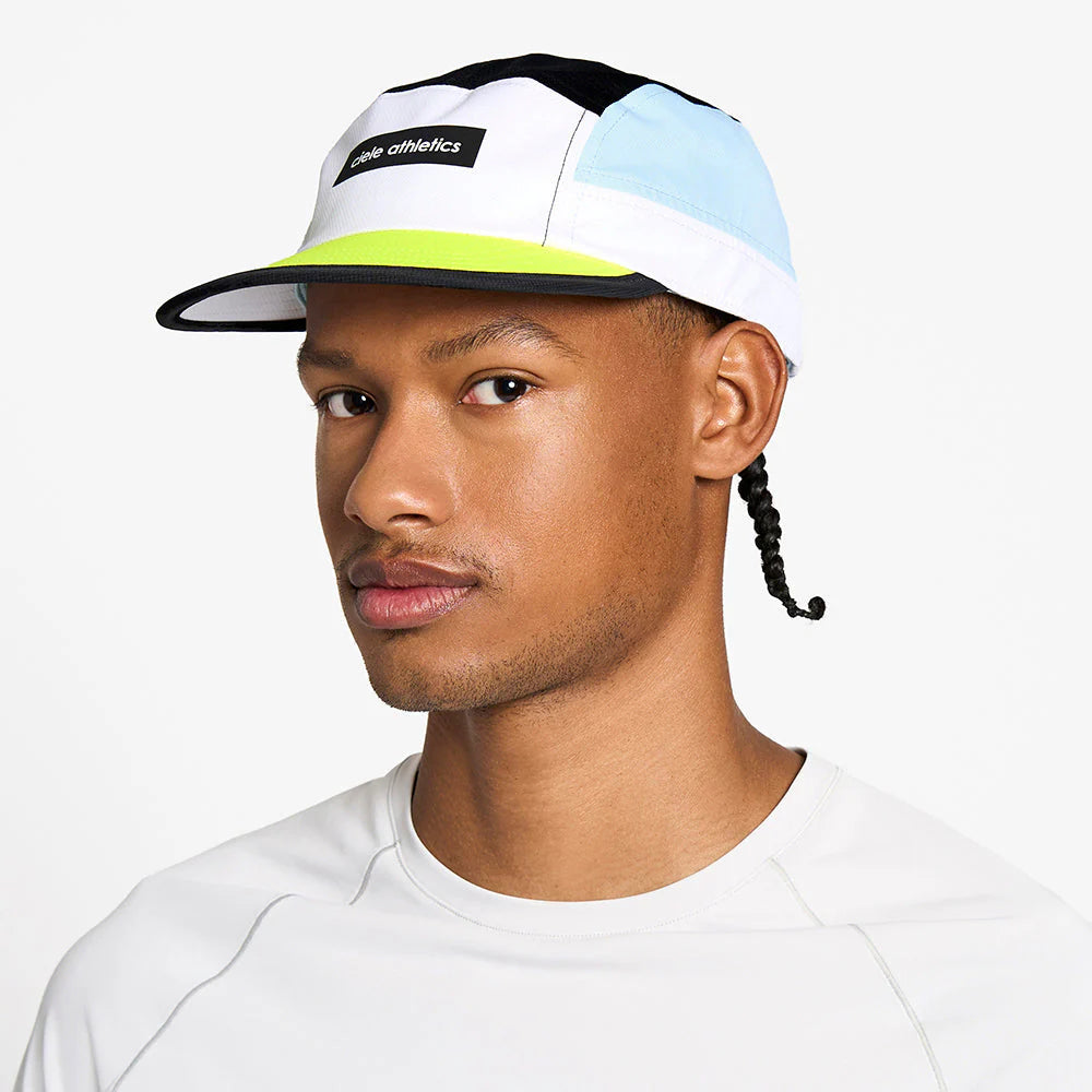 GOCap - Field - IconicBar by Ciele in white, black, light blue, and neon yellow with Coolmatic Plus Flowmesh for ventilation, ideal for running and outdoor use