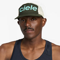 GOCap - Comp - Century by Ciele in green and white with stretch flexweave fabric, fitted comfort, and UPF 50+ protection for running and outdoor use
