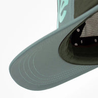 GOCap - Comp - Century by Ciele in muted green with stretch flexweave fabric and UPF 50+ for running and outdoor protection