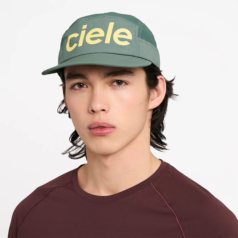 GOCap - Comp - Century by Ciele in green with yellow logo, stretch flexweave fabric, fitted comfort, UPF 50+ protection, ideal for running and outdoor use