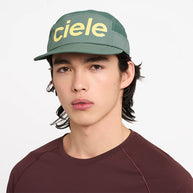 GOCap - Comp - Century by Ciele in green with yellow logo, stretch flexweave fabric, fitted comfort, UPF 50+ protection, ideal for running and outdoor use