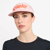 GOCap - Comp - Century by Ciele in pink with orange logo, stretch flexweave fabric, UPF 50+ protection, ideal for running and outdoor use