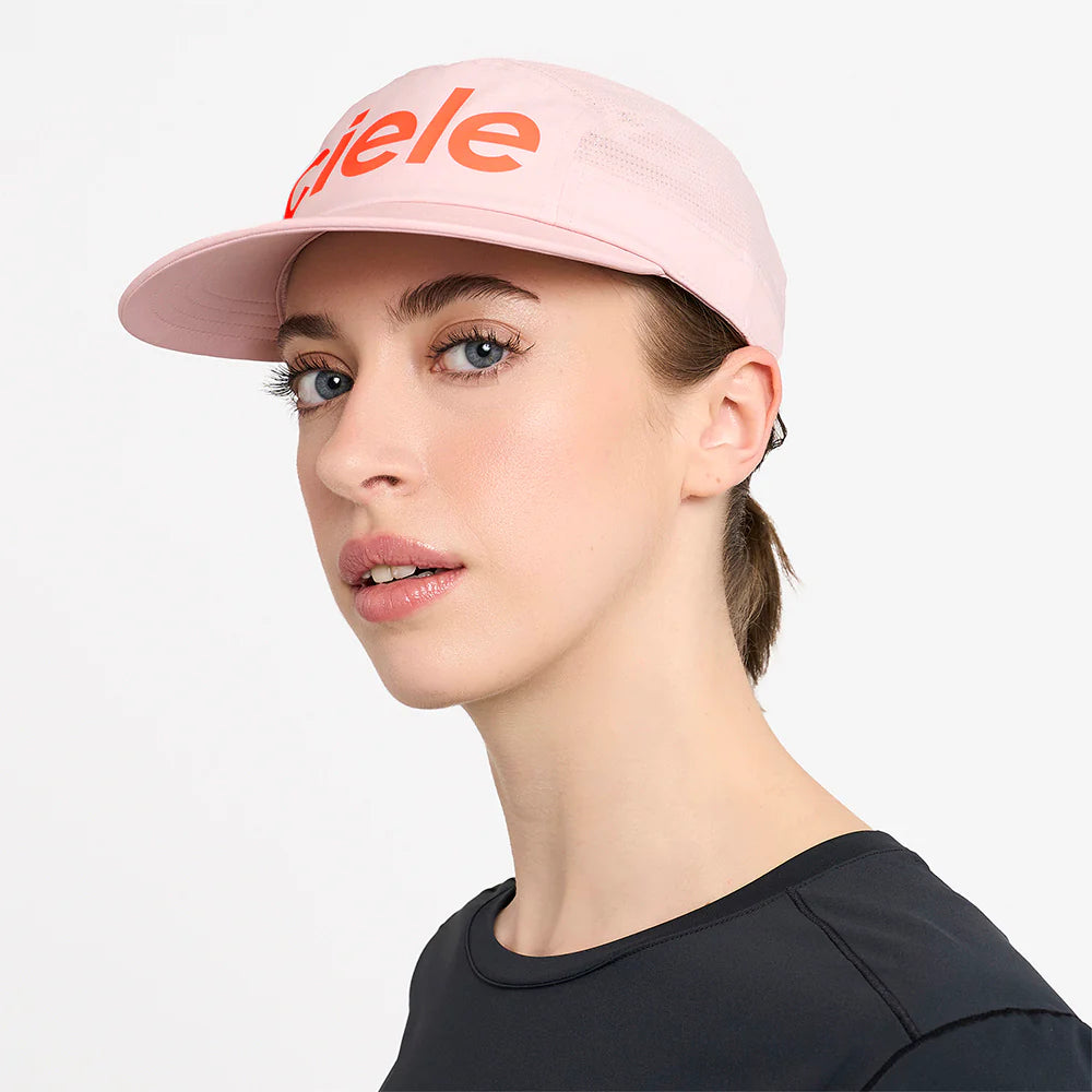 GOCap - Comp - Century by Ciele in light pink with orange logo, stretch flexweave fabric, fitted comfort, UPF +50 protection for running