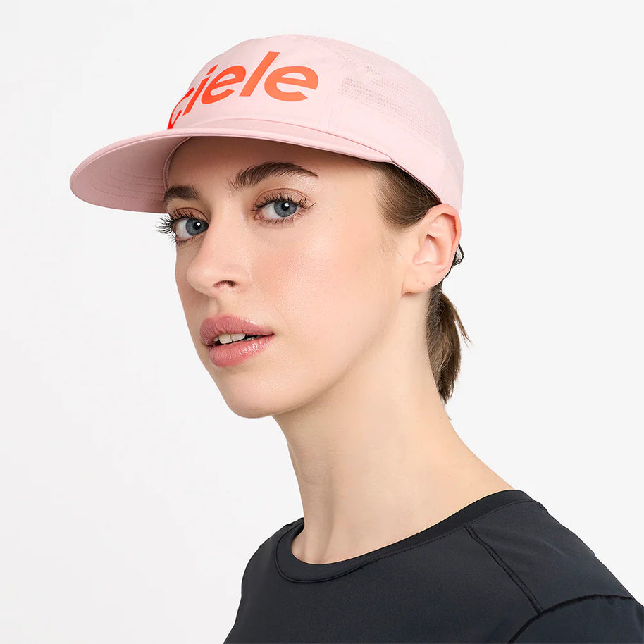 GOCap - Comp - Century by Ciele in light pink with orange logo, stretch flexweave fabric, fitted comfort, UPF +50 protection for running