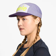GOCap - Comp - Century by Ciele in purple and white with yellow logo, stretch flexweave fabric and UPF 50+ for running and outdoor use