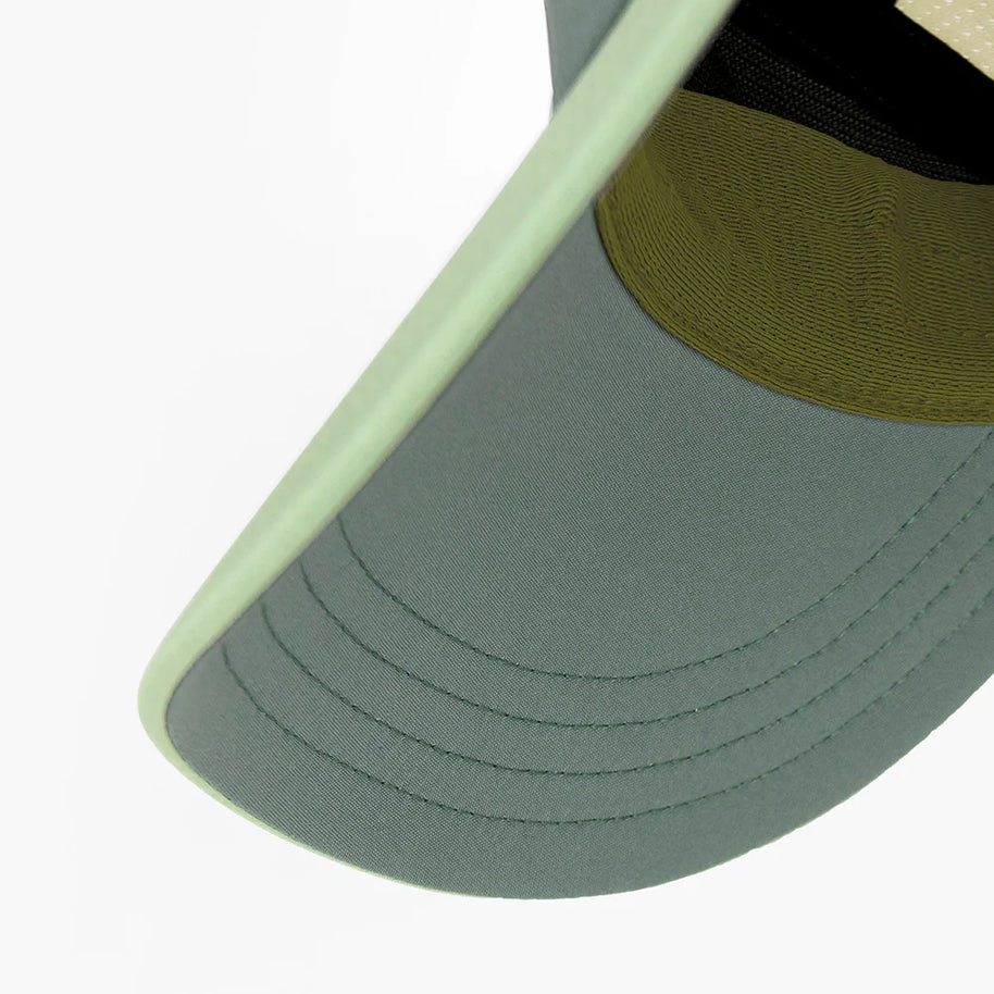 FSTCapSC - Comp - IconicVC by Ciele in green tones with fit-focused flexweave fabric, UPF protection, and coolmatic mesh for running and outdoor use