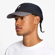 GOCapSC - Comp - Ccube by Ciele in black and grey with reflective label, softcurved stretch flexweave fabric for fitted comfort and running use