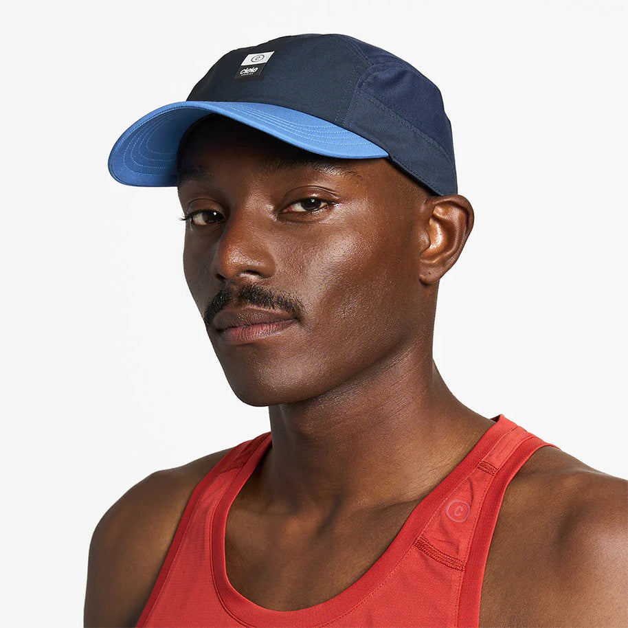 GOCapSC - Comp - Ccube by Ciele in navy and light blue with reflective label and stretch flexweave fabric for fitted comfort ideal for running