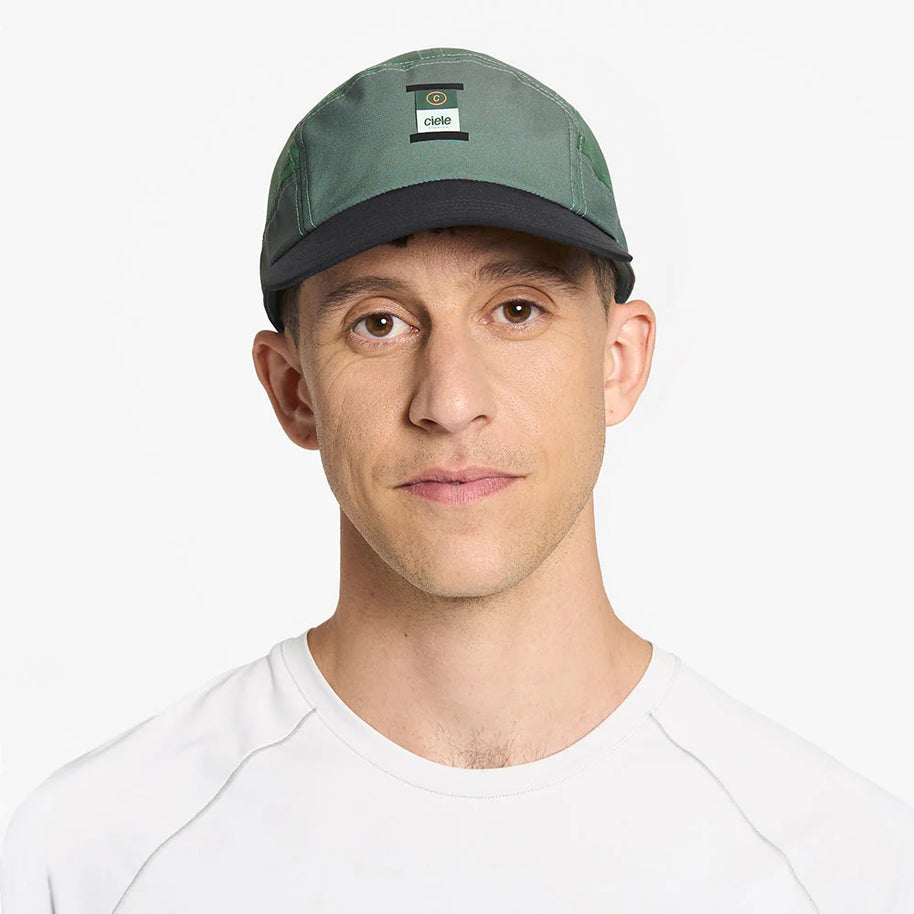 GOCapSC - Comp - Ccube by Ciele in green and black with reflective label and stretch flexweave fabric for fitted comfort and running use