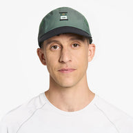 GOCapSC - Comp - Ccube by Ciele in green and black with reflective label and stretch flexweave fabric for fitted comfort and running use