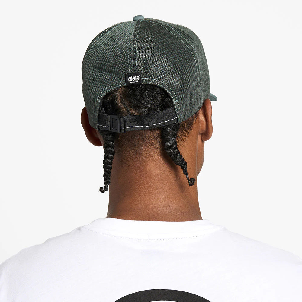 TRLCapSC - Comp - Onehundred by Ciele in dark green with adjustable strap, higher crown design for enhanced air circulation and cooling, ideal for running and outdoor use