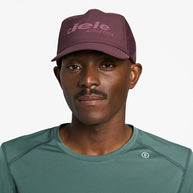 TRLCapSC - Comp - Onehundred by Ciele in dark purple with higher crown for better air circulation, soft fit cap ideal for running and outdoor use
