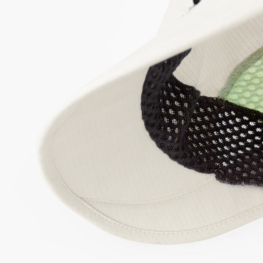 FSTCap-Elite-Ethereal by Ciele in light beige with black mesh, ultra-lightweight technical running cap designed for performance and comfort