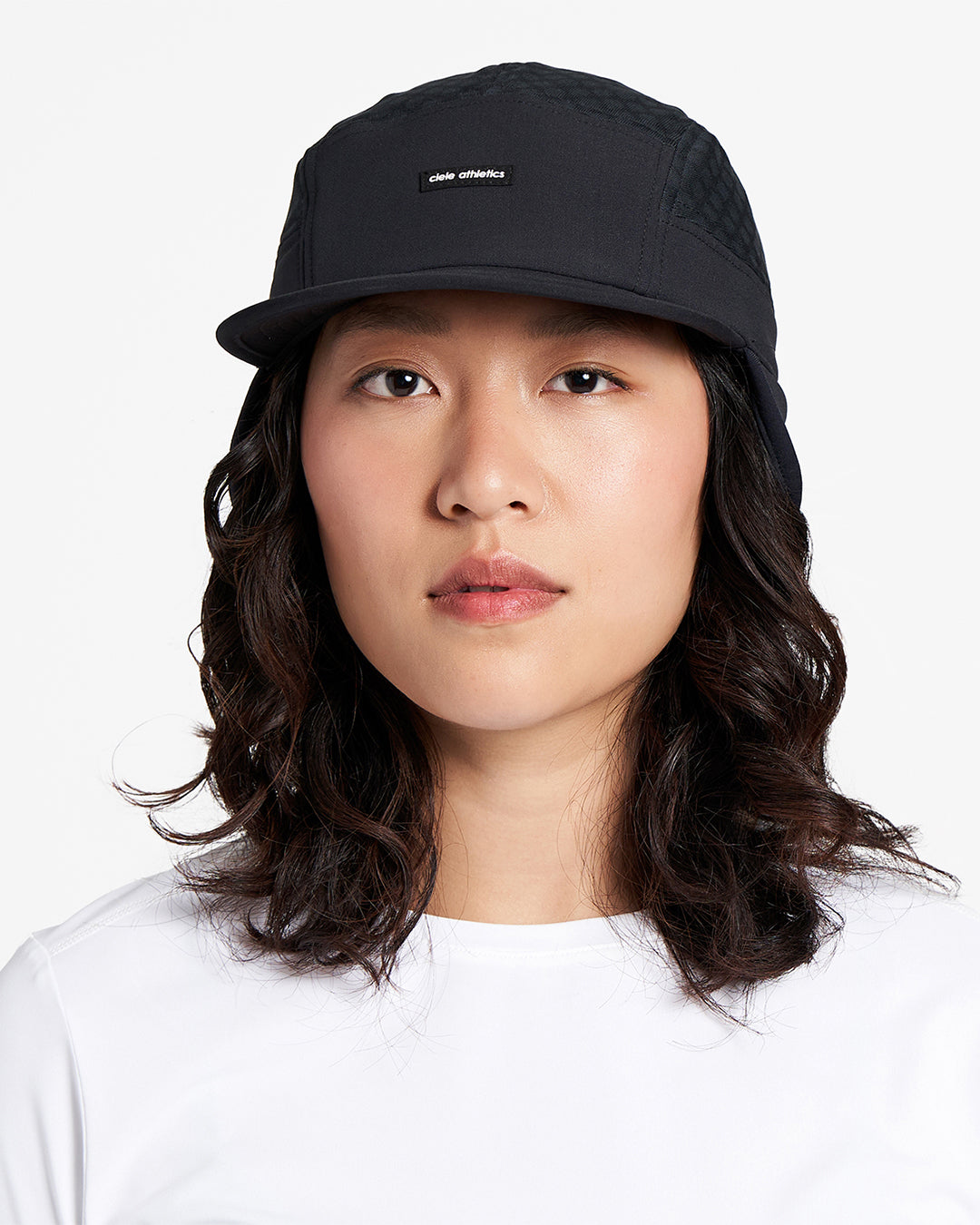 GOCap-FLTWND-UltraIconic by Ciele in black with fold-away ear flaps, cold weather cap for running and outdoor use in Canada