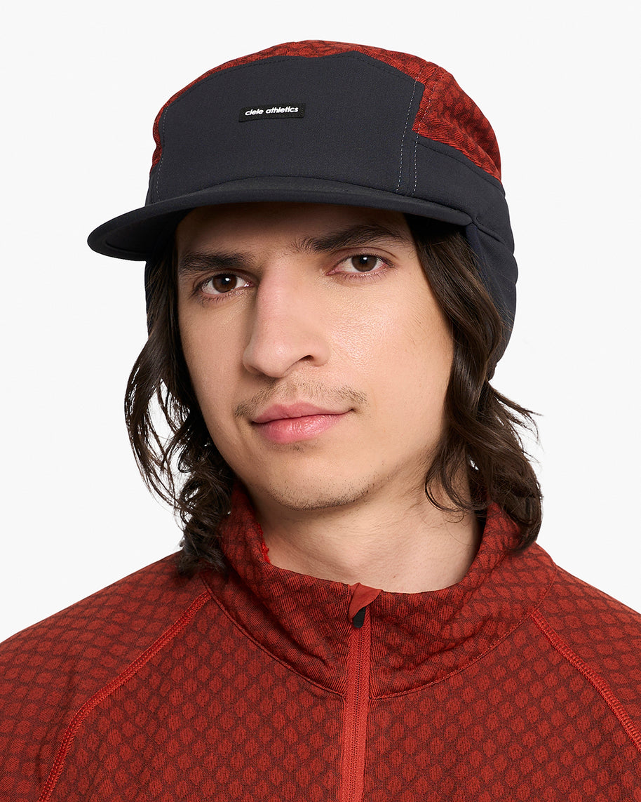 GOCap-FLTWND-UltraIconic by Ciele in black and red with fold-away ear flaps, cold weather cap for running and storm protection in Canada
