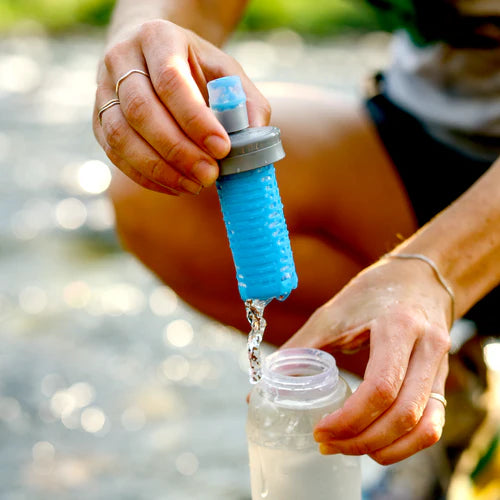 Ultra Flask + 500ml Filter Kit by Hydrapak in clear and blue, lightweight hydration system with compact filter for clean water on the go