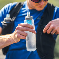 Ultra Flask + 500ml Filter Kit by Hydrapak in translucent blue and gray, lightweight water flask with built-in filter for clean hydration outdoors