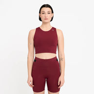 FST Bra - Women by Ciele in deep red, medium-support sports bra with lightweight comfort and storage, designed for running performance.