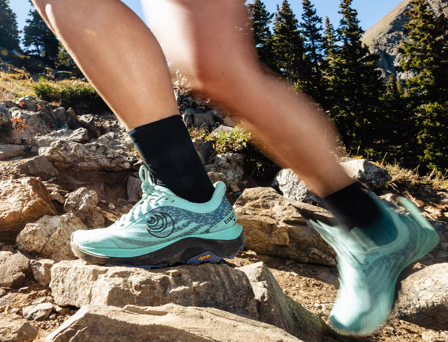 Ultraventure 4 - Women by Topo Athletic in teal and black, cushioned trail running shoe with roomy toe box for comfort and rugged terrain