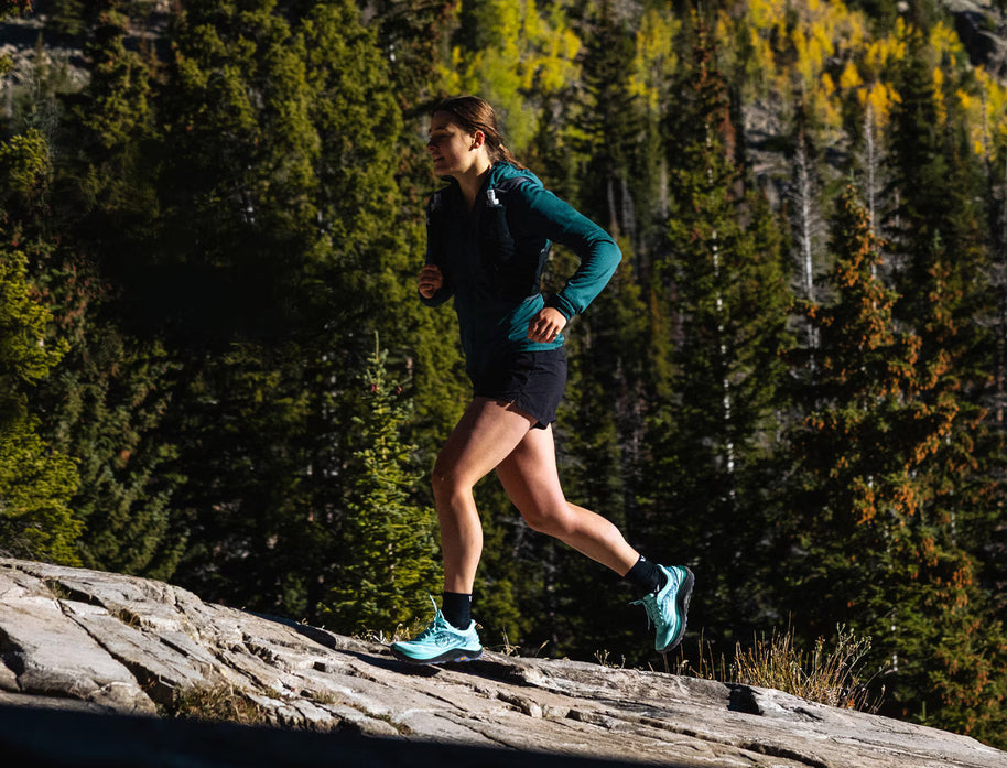 Ultraventure 4 - Women by Topo Athletic in blue, lightweight trail running shoes with roomy toe box ideal for rugged outdoor trails