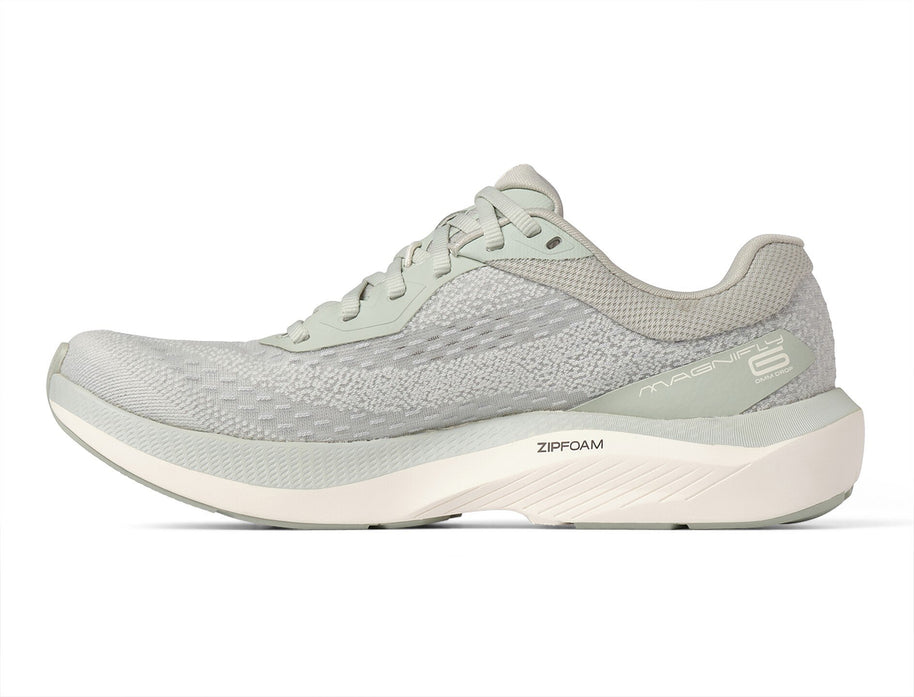 Inner side of the Topo Magnifly 6 women's road running shoe in Sage/Cream
