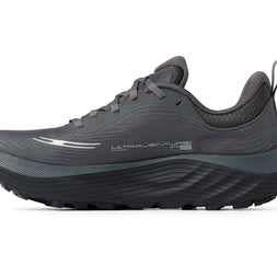 Inner side of the Topo Ultraventure 5 GTX women's trail running shoe in Grey/Butter with dark midsole