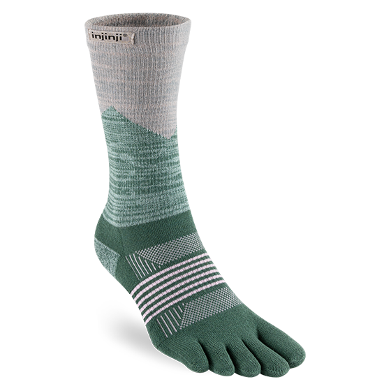 Trail Midweight Crew - Women by Injinji in green and beige, midweight toe socks reducing friction for fast rugged terrain movement