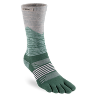 Trail Midweight Crew - Women by Injinji in green and beige, midweight toe socks reducing friction for fast rugged terrain movement
