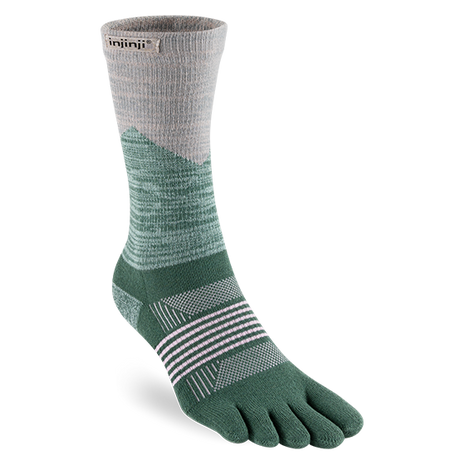 Trail Midweight Crew - Women by Injinji in green and beige, midweight toe socks reducing friction for fast rugged terrain movement