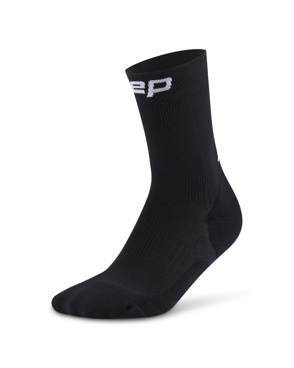 Core Run Socks Mid Cut, 5.0 - Women by CEP Sports in black, compression socks with targeted zones for joint and muscle support ideal for running
