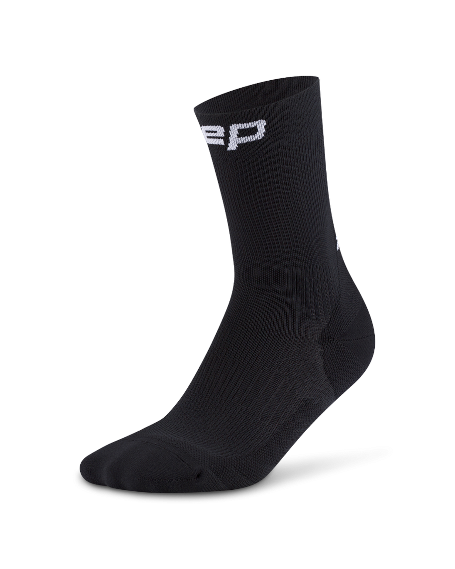 Core Run Socks Mid Cut, 5.0 - Women by CEP Sports in black, compression socks with targeted zones for joint and muscle support ideal for running
