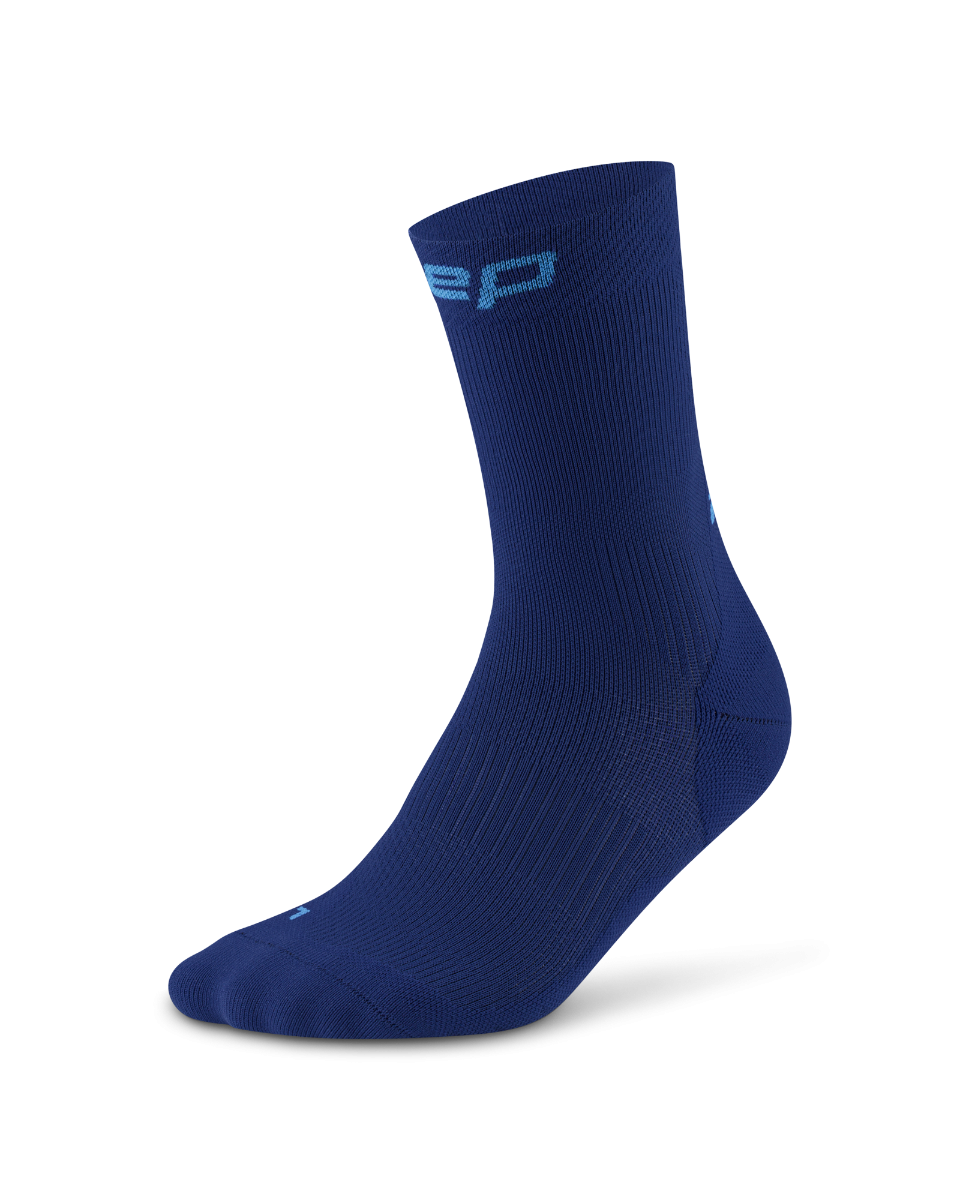 Core Run Socks Mid Cut, 5.0 - Men by CEP Sports in navy blue, compression running socks with targeted support for joint activation and comfort