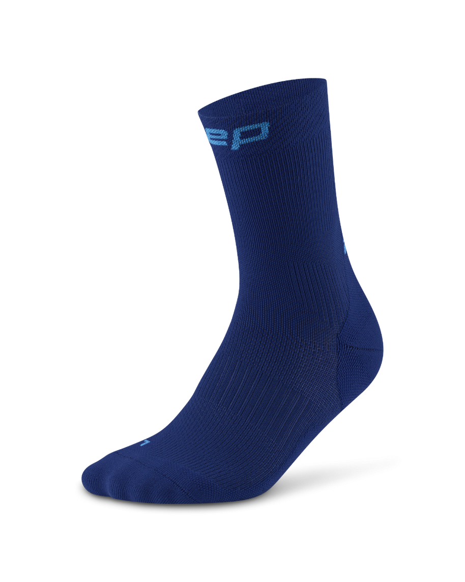 Core Run Socks Mid Cut, 5.0 - Men by CEP Sports in navy blue, compression running socks with targeted support for joint activation and comfort