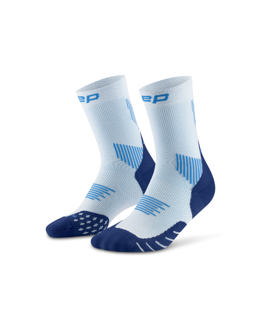 Core Run Socks Mid Cut, 5.0 - Women by CEP Sports in light blue and navy, compression socks for targeted muscle and joint support during running