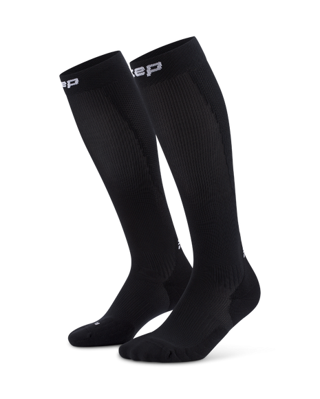 Core Run Socks Tall, 5.0 - Men by CEP Sports in black, high compression running socks designed for activation and support during running.
