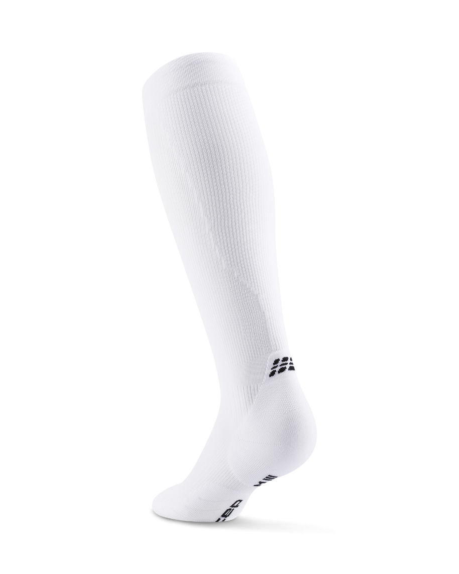 Core Run Socks Tall, 5.0 - Women by CEP Sports in white, high compression running socks for enhanced support and activation during runs