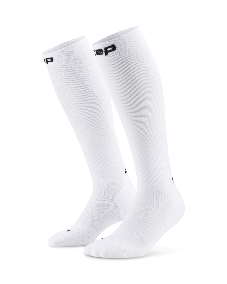 Core Run Socks Tall, 5.0 - Women by CEP Sports in white, compression socks made in Germany for running and activation support