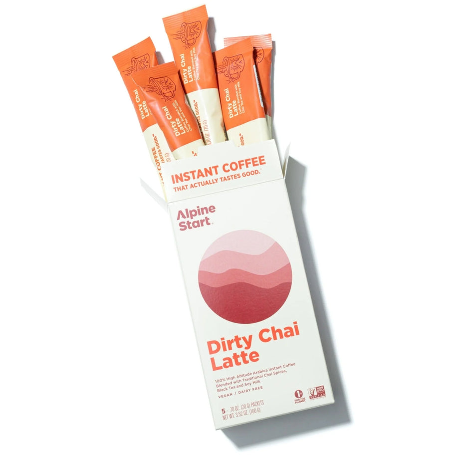 Instant Coffee: Dirty Chai Latte by Alpine Start in orange and white packaging, instant Colombian Arabica coffee with chai spices and soy milk, bold creamy flavor
