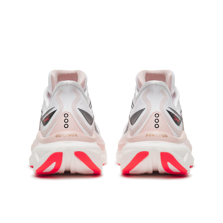 Back heel view of a pair of Saucony Endorphin Speed 6 women's shoes in White/Chic with red outsole