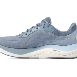 Inner side of the Topo Ultrafly 6 women's road running shoe in Blue/White with pale blue midsole