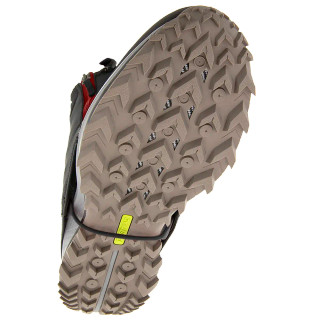 Underside of a trail shoe showing the strap of the Kahtoola INSTAgaiter Low in Basalt