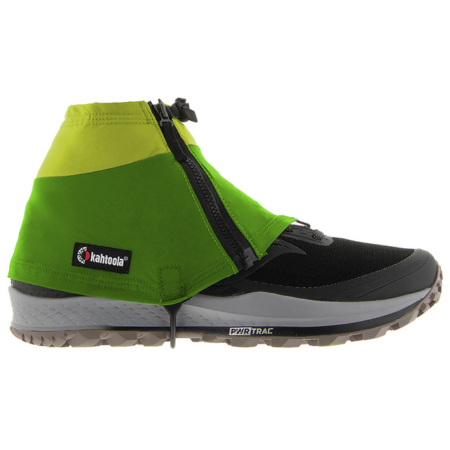 Kahtoola INSTAgaiter Low in Kiwi, two-tone lime and green gaiter on a black trail shoe, side view