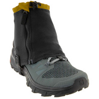Kahtoola RENAgaiter Low in Raven on a trail shoe, front three-quarter view with zip and lace hook